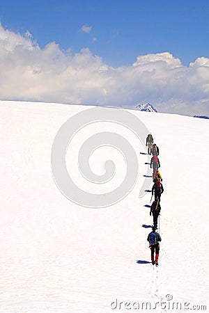 Summit alpinist group Stock Photo