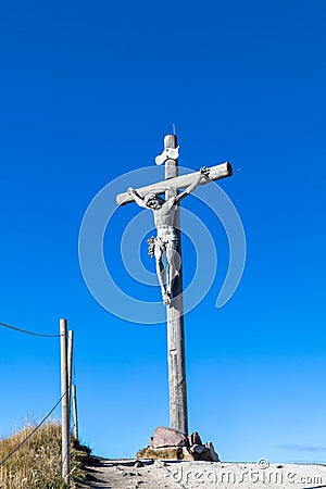 Summit cross of Seceda mountain Stock Photo