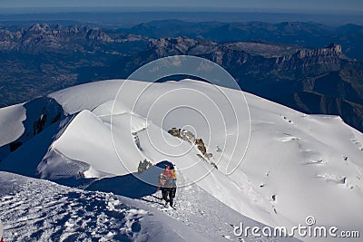 Alpinist attempting the Montblanc summit in the Alps Editorial Stock Photo