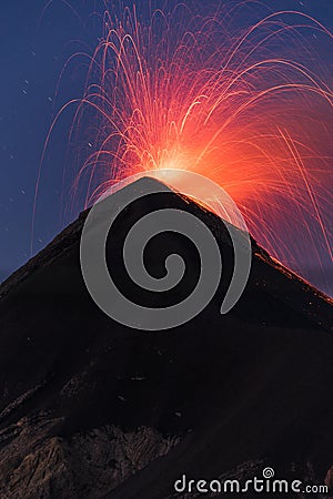 Summit of the volcano Fuego at twilight Stock Photo