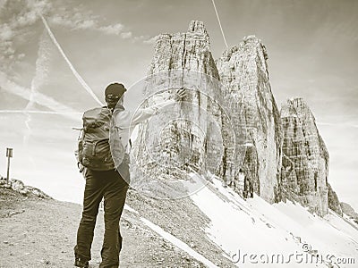 Summits of Alps mountains. Tourist walk with backpack Stock Photo