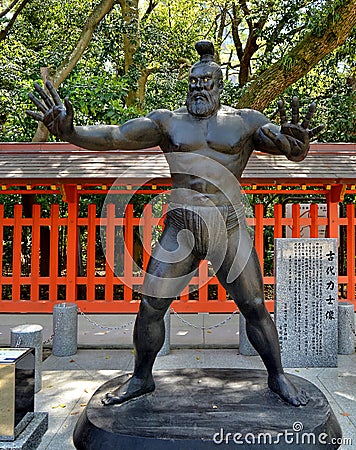 Sumo wrestler statue at Sumiyoshi Shrine in Fukuoka city, Japan. Editorial Stock Photo