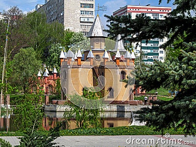 Fairy-tale castle on the bank of the pond in Kazka park in Sumy Editorial Stock Photo