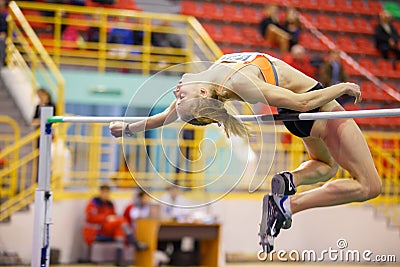 SUMY, UKRAINE - FEBRUARY 9, 2018: Alina Shukh - winner of pentathlon competition on Ukrainian indoor track and field Editorial Stock Photo