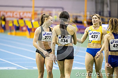 SUMY, UKRAINE - FEBRUARY 20, 2020: Viktoriya Ratnikova wins 60m final at Ukrainian indoor track and field championship Editorial Stock Photo