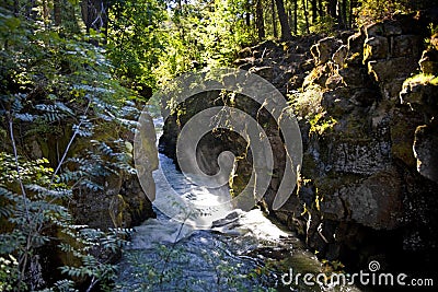 Sun beams down on the Rogue River Gorge Stock Photo