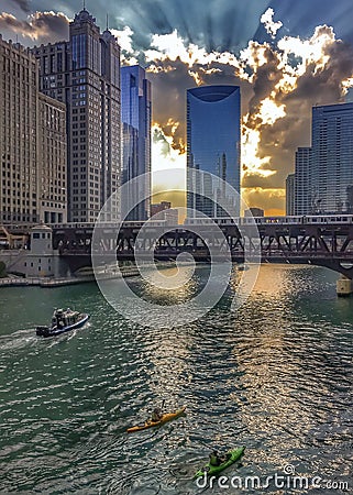 Chicago River reflections of sunset and buildings as sun sets Stock Photo