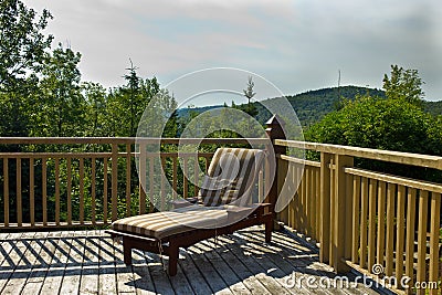 Sun chair on a wooden deck Stock Photo