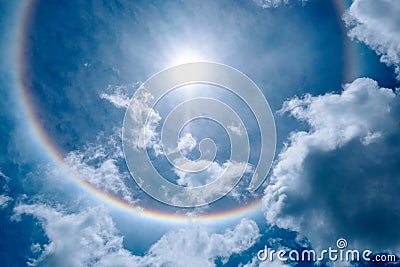 Sun Halo in the Beautiful Sky with Fluffy Clouds Stock Photo