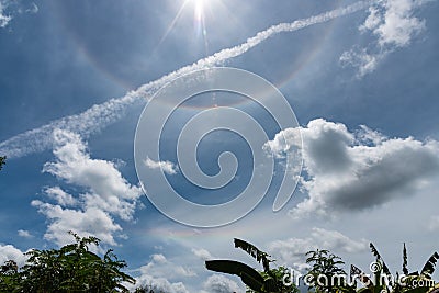 Sun halo blue sky and clouds Stock Photo