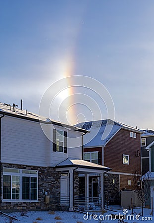 Sun Halo over the houses Stock Photo