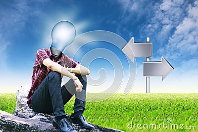 The sun in lamp man and empty signposts on landscapes background Stock Photo