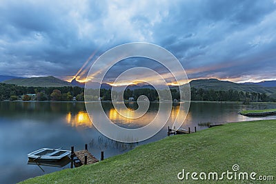 Sun rays behind Rhino Peak Stock Photo