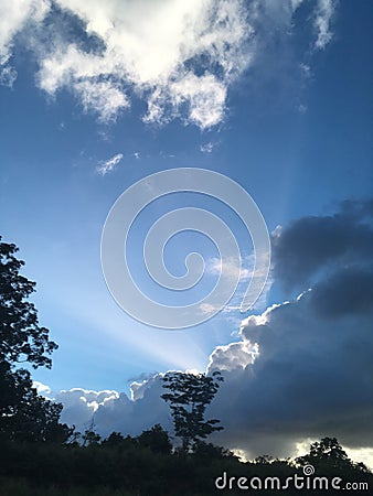Sun rays in Blue sky Stock Photo