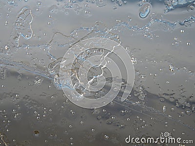 Sun rays caught in cracks in ice piece. Broken floe Stock Photo