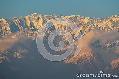 Sun rays mountain landscapeA beautiful landscape view with sun beams through clouds from the top of a mountain. Stock Photo