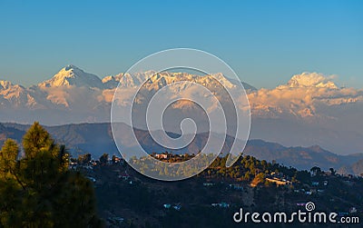 Sun rays mountain landscapeA beautiful landscape view with sun beams through clouds from the top of a mountain. Stock Photo