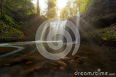 Sun Rays over Hidden Falls in Clackamas OR Stock Photo