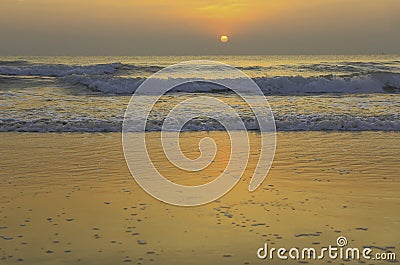 Sun rise on the golden sand Stock Photo