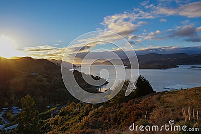 Sun rise over Governors Bay, New Zealand Stock Photo
