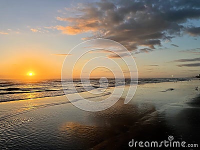 Sunrise at the beach Stock Photo