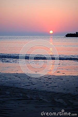 Sunrise on a beach Stock Photo