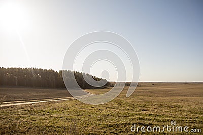 The sun's rays among the clear blue sky . Stock Photo