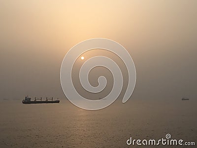 Sun set at sea Stock Photo