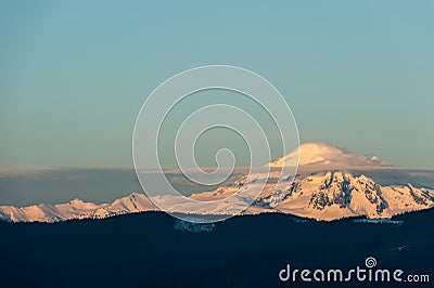 The sun sets on Mt Baker Stock Photo