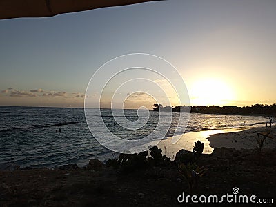 the sun sets over the sea Stock Photo