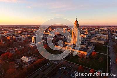 The sun sets over the State Capital Building in Lincoln Nebraska Stock Photo