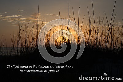 Scripture verse: John 1:5 The light shines in the darkness and the darkness has not overcome it. Stock Photo