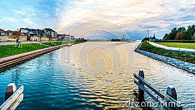 Sun setting over the harbor of Harderwijk in the Netherlands Stock Photo