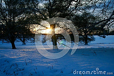 Sun setting on a snowy Landscape in Teesdale, County Durham. Stock Photo