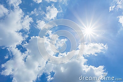 The sun shines bright in the daytime in summer. Blue sky and clouds. Stock Photo