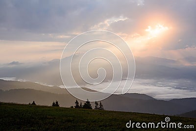 Sun shining through the clouds at Martinske Hole, Slovakia Stock Photo