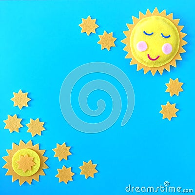 Sun Stars Composition on Blue Background Stock Photo