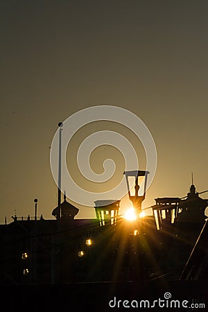 Sun At Sunset and Cityscape in a Torrid Day. Destin Beach, Florida Stock Photo