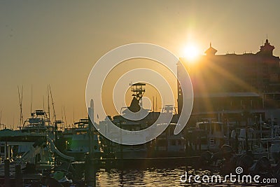 Sun At Sunset and Cityscape in a Torrid Day. Destin Beach, Florida Stock Photo
