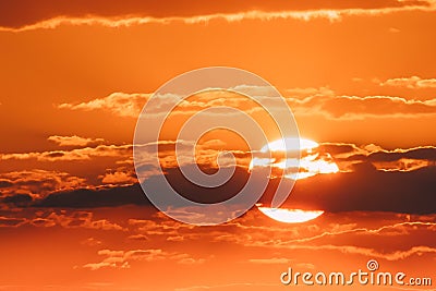Sun In Sunset Sunrise Sky Cloudscape. Sunshine Dramatic Sky Through Clouds. Stock Photo