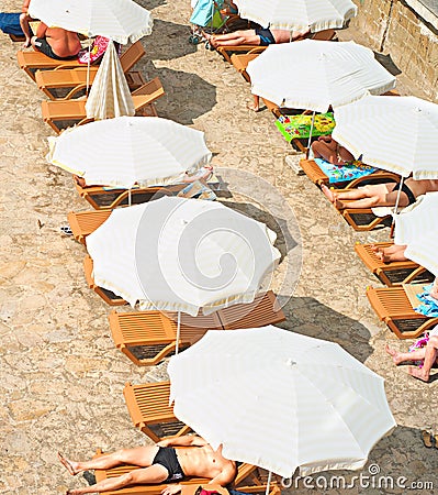 Sunbath in a beach Editorial Stock Photo