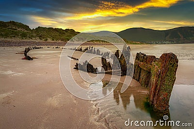 The Sunbeam ship wreck on the Rossbeigh beach at sunset, Ireland Stock Photo