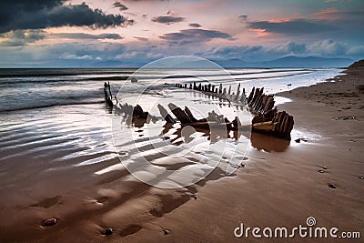 The Sunbeam ship wreck on the Rossbeigh beach at sunset, Ireland Stock Photo