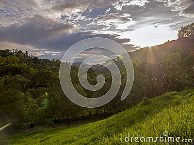 Sunbeams projecting over the Andean mountains Stock Photo