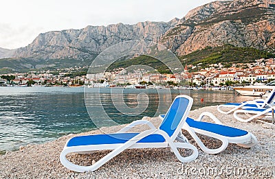 Sunbeds in Makarska beach Stock Photo