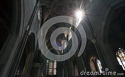 Sunburst and flare in a cathedral roof Stock Photo