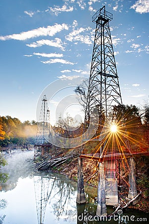 Sunburst oil derricks Stock Photo