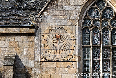 Sundial adorning the wall of the Notre-Dame de Croas-Batz, Roscoff, France Stock Photo