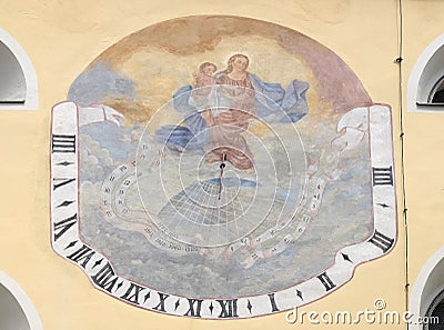 Sundial on the facade of Saint John the Baptist church in Varazdin, Croatia Stock Photo