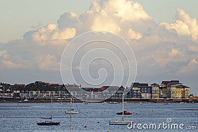 Starcross evening, Exmouth, devon: low tide, sunset. Cloudscape horizon Editorial Stock Photo